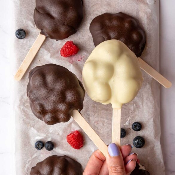 Dark and white chocolate blueberry yoghurt cluster lollies.