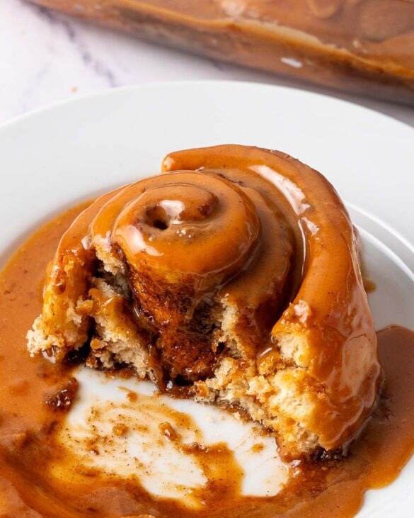 Caramel pumpkin spice latte roll on a plate.