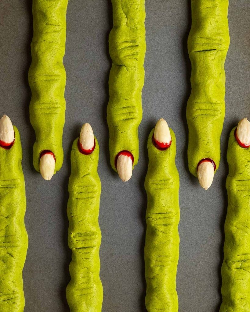 witch finger shortbread cookies on a baking sheet.