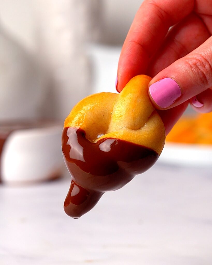 Pretzel dipped in melted chocolate 
