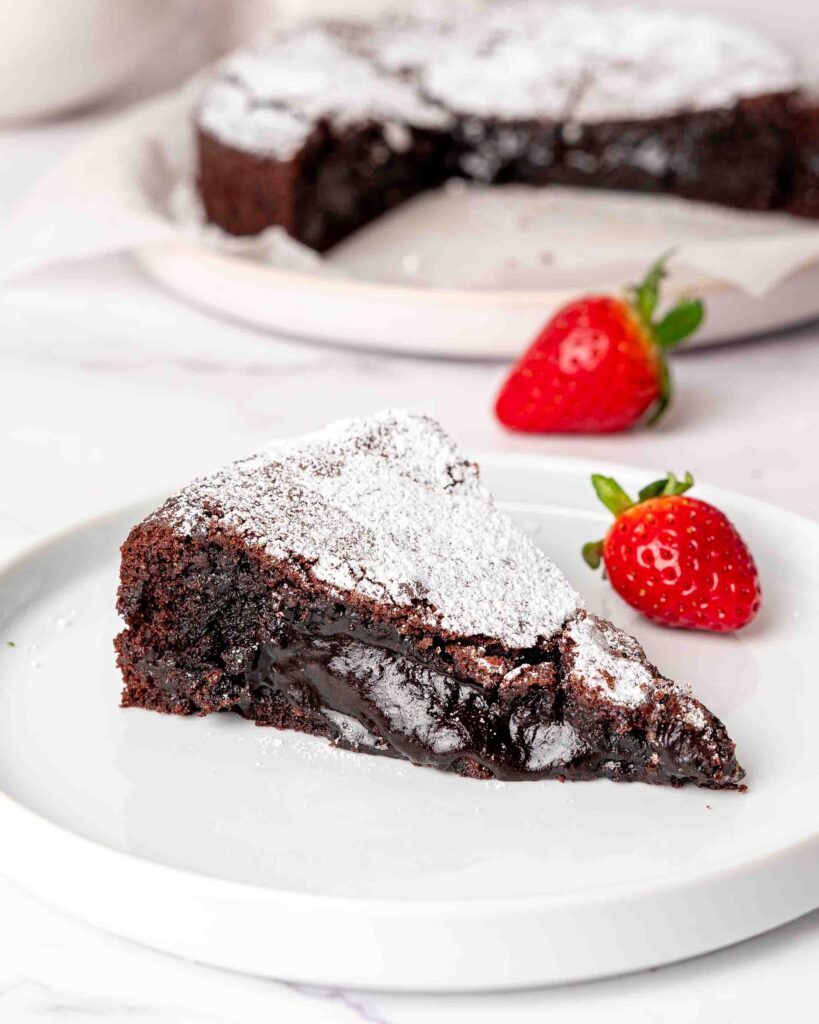 A slice of Kladdkaka on a plate.