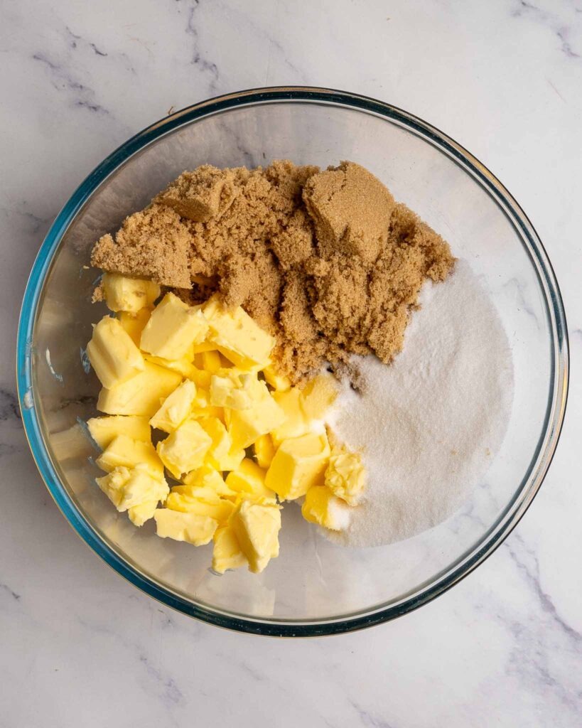 Butter ans sugar In a mixing bowl.