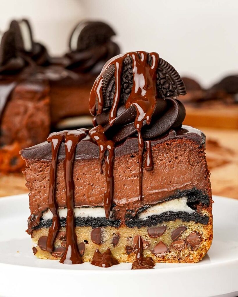 Slutty-basque-cheesecake.jpg - Ems Foodie Fix Slice of Slutty basque cheesecake with a chocolate drizzle.