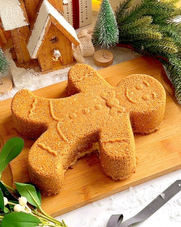 Gingerbread man shaped biscoff cheesecake served upside down.