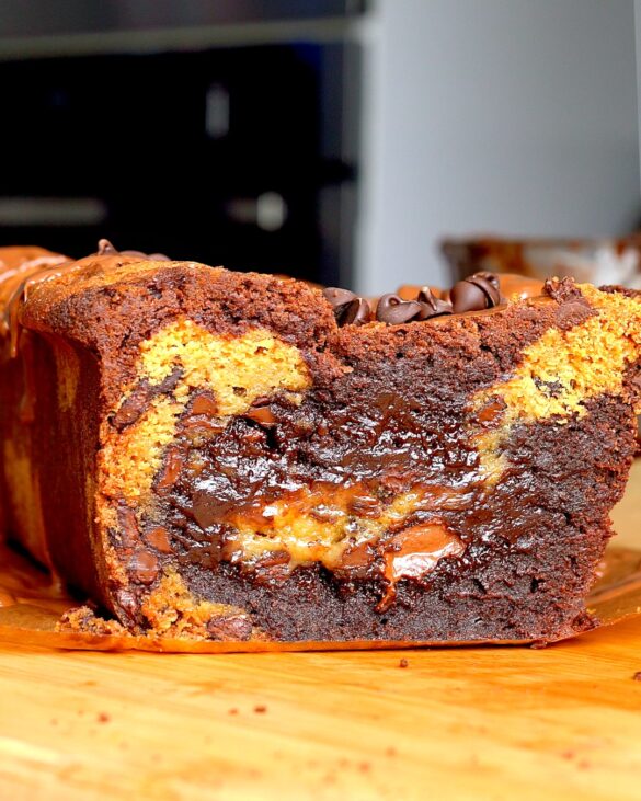 Brookie Loaf Cake showing the fudgy inside with swirls of brownie and cookie.