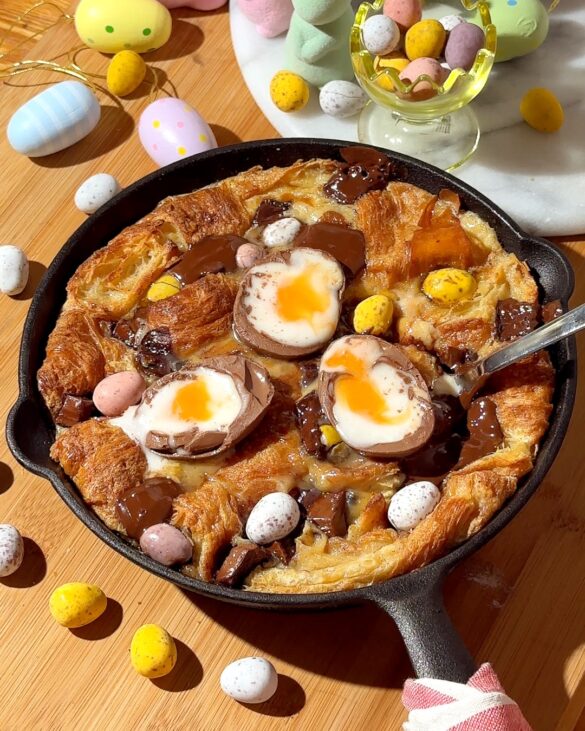 Mini Egg Croissant Bread and Butter Pudding with creme eggs on top for Easter.