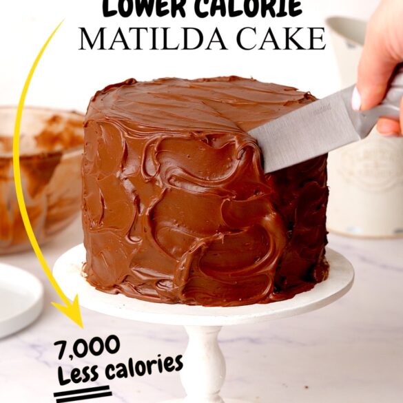 Fudgy Matilda cake covered in messy chocolate ganache being cut with a knife.