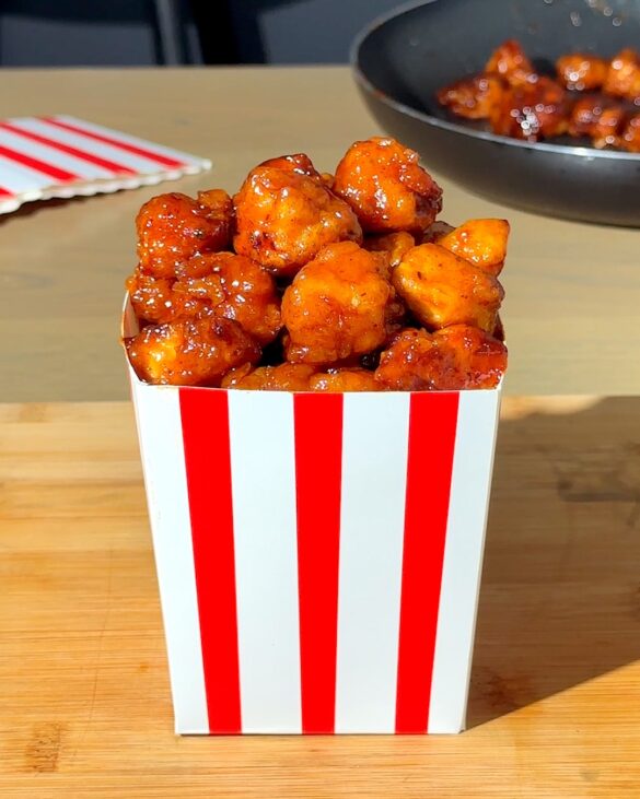 KFB Honey bbq popcorn chicken in a red and white stripy popcorn box.