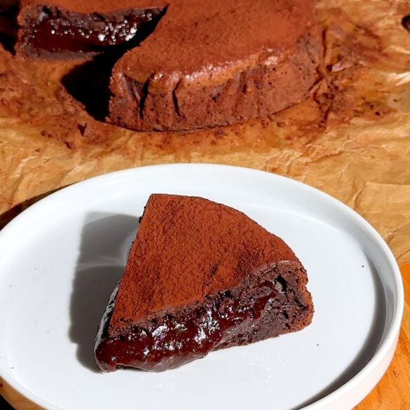 A slice of fondant au chocolat on a plate