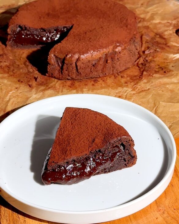 A slice of fondant au chocolat on a plate