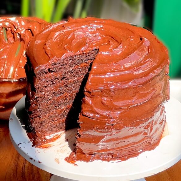 The-Ultimate-Chocolate-Fudge-Cake-6-Layer-Matilda-Cake.jpg The Ultimate Chocolate Fudge Matilda Cake with a slice removed revealing a 6 layer slice.