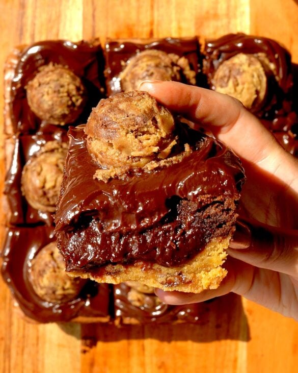 Furdgy Cookie Dough Brookies with scoops of cookie dough on top.
